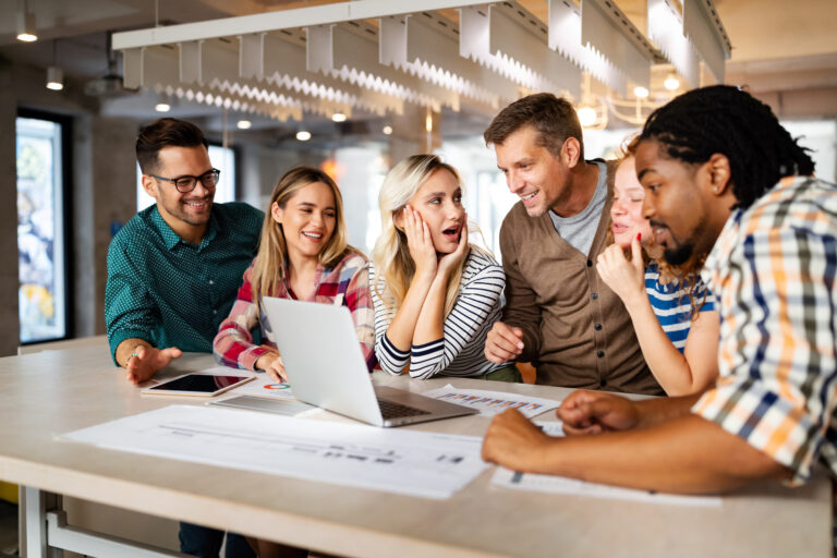 Company employees working in software development and designer office