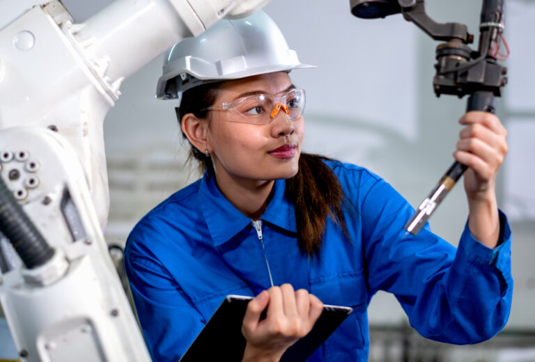 close-up-factory-worker-woman-maintenance-and-chec-2022-01-19-00-11-23-utc