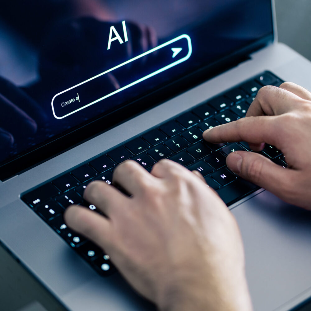 AI chat prompt. Artificial intelligence and digital technology. Man using chatbot with laptop at work. Creative content. Generate text or image. Command input on website. Bot assistant conversation.